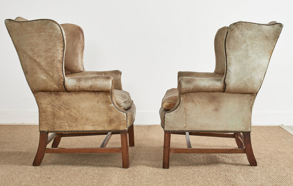Pair of English Georgian Cigar Leather Wingback Library Chairs