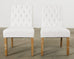 Set of Fourteen Tufted Scroll Back Dining Chairs