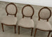Set of Four French Louis XVI Style Walnut Dining Chairs