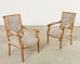 Pair of French Louis XVI Style Carved Beech Armchairs