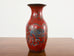 Pair of Chinese Qing Red Lacquer Foo Dog Lion Vases