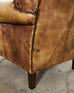 Pair of Distressed Cigar Leather Wingback Chairs with Ottomans