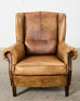 Pair of Distressed Cigar Leather Wingback Chairs with Ottomans