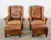 Pair of Distressed Cigar Leather Wingback Chairs with Ottomans