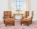 Pair of Distressed Cigar Leather Wingback Chairs with Ottomans