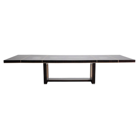A Dakota Jackson modern rectangular dining table with a dark wood top and base, accented by thin gold-toned metal lines.