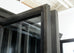 Industrial Style Zinc Metal Wrapped Glass Door Bookcase