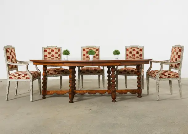 A French Louis XVI Neoclassical style distressed ormolu-mounted, veneer and  parquetry inlaid eleven pieces Dining Room Set