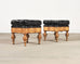 Pair of Empire Aesthetic Leather Giltwood Ottoman Footstools