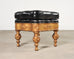 Pair of Empire Aesthetic Leather Giltwood Ottoman Footstools