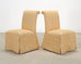 Pair of Skirted Scroll-Back Woven Raffia Slipper Chairs