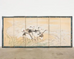 Pair of Japanese Meiji Six Panel Screen Cranes Above Cresting Waves