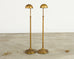 Pair of Patinated Brass Adjustable Pharmacy Floor Lamps