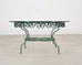 O.W. Lee American Regency Style Wrought Iron and Glass Scrolled Garden Table