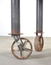 Industrial Style Round Machined Iron Center Table on Casters