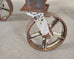 Industrial Style Round Machined Iron Center Table on Casters
