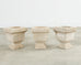 Set of Three Neoclassical Style Carved Stone Urn Planters