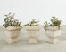 Set of Three Neoclassical Style Carved Stone Urn Planters