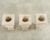 Set of Three Neoclassical Style Carved Stone Urn Planters