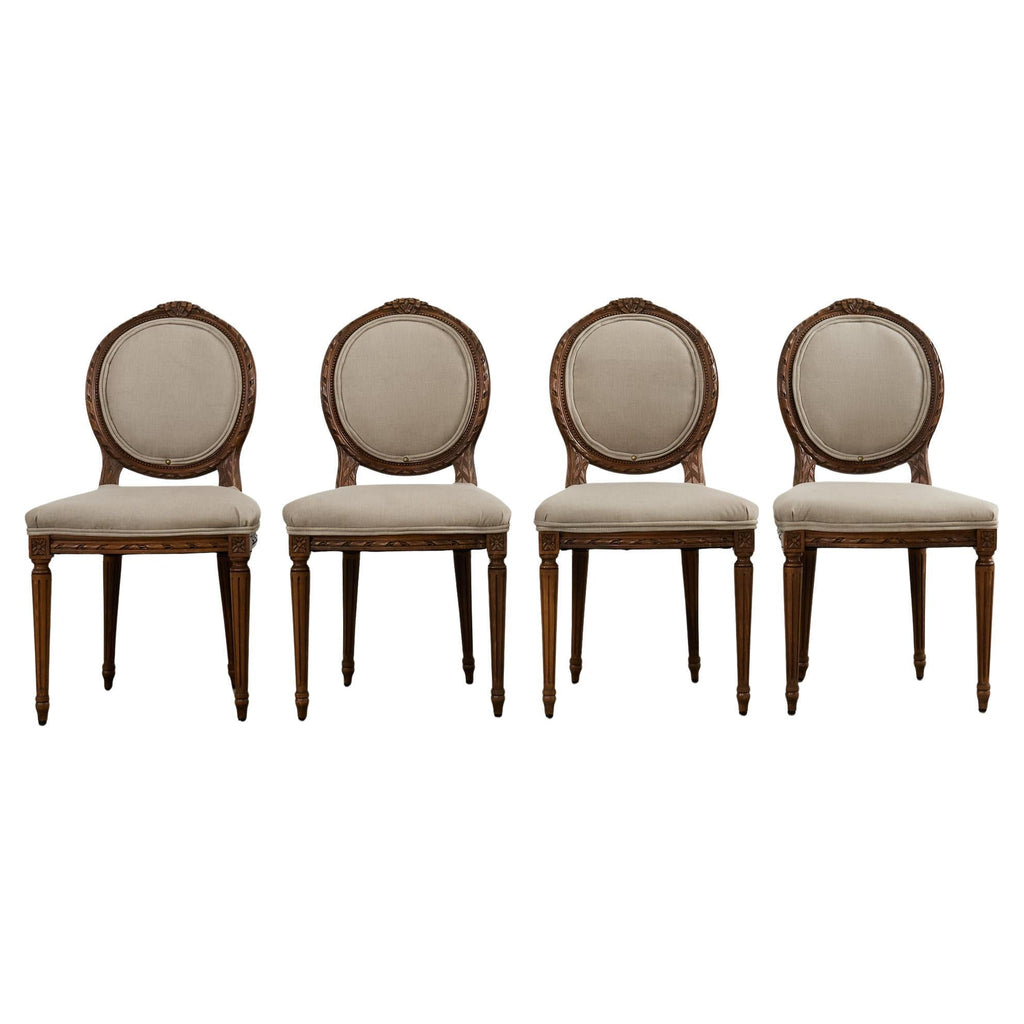 Set of Four French Louis XVI Style Walnut Dining Chairs