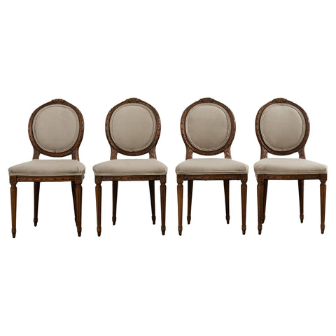 Set of Four French Louis XVI Style Walnut Dining Chairs