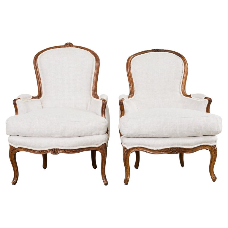 Pair of French Louis XV Style Walnut Bergeres with Linen