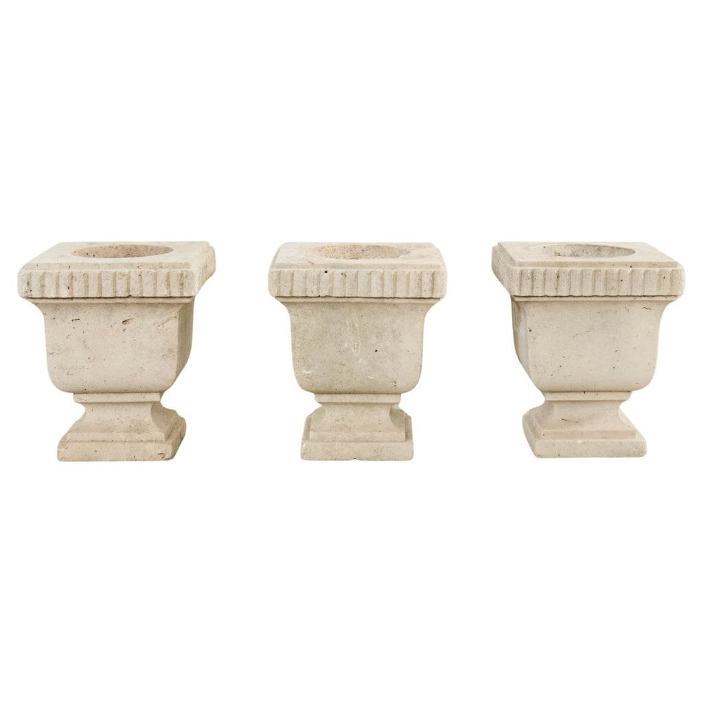 Set of Three Neoclassical Style Carved Stone Urn Planters
