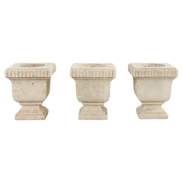 Set of Three Neoclassical Style Carved Stone Urn Planters