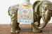 Pair of Chinese Jade Colored Porcelain Elephant Candlesticks