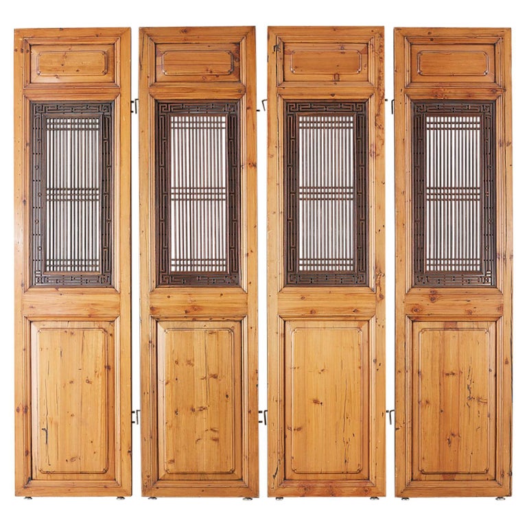 Set of Four Chinese Carved Elm Lattice Door Panels